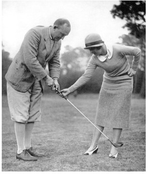 In 1931,Sheehan took this photograph of Ty Cobb receiving a golf lesson from Glenna Collett Vare, who won the U.S. Women's Amateur six times. Cobb was from Augusta, and this photograph was taken there--possibly at Augusta National.