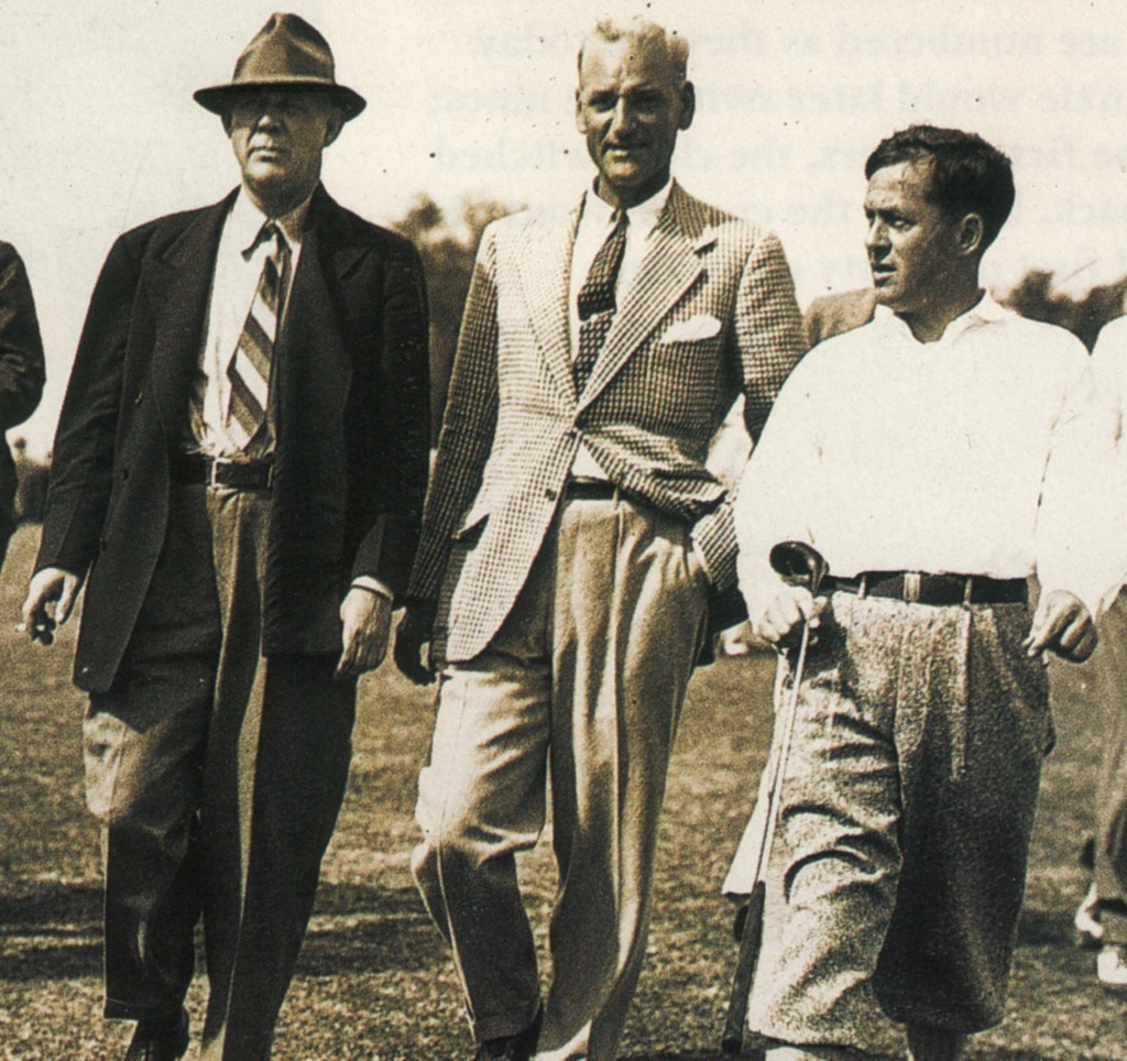 That's Grantland Rice on the left and Bobby Jones on the right, during an early Masters. I don't know who is in the middle.